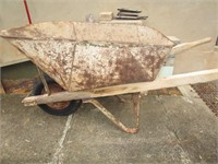 Early nice concrete wheel barrel; pick up only