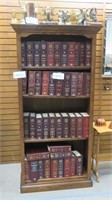 Upright oak four shelf book case