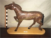 Handcarved thoroughbred horse statue
