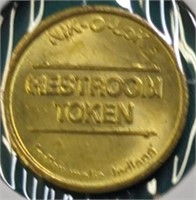 Token nik-o-lok restroom token