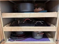 Cabinet full of pots & pans including Curtis stone