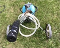 Small sprayer with wand on wheels