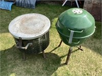 Two shop built fire pits on legs with covers