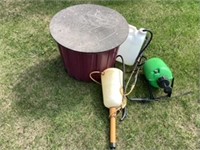 Various small garden sprayers and storage