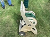 Plastic hose reel on wheels complete with hose