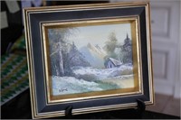 framed oil painting of a landscape, signed