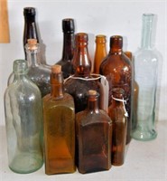 Lot #4392 - (12) vintage and collectable bottles