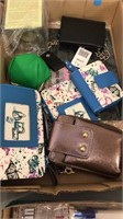 Box lot of new wallets cell cases and ect