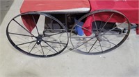 Pair of large metal wheels