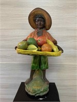 LARGE BOY WITH FRUIT-CHALKWARE STATUE