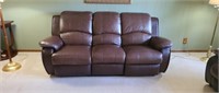 84 in brown leather double reclining sofa, good