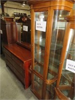 LIGHTED TWO DOOR CURVED GLASS CURIO CABINET