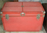 Red steamer trunk, with metal accents