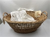 Vintage children’s clothing in large basket