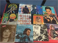 12 vintage record albums. Prince Alice Cooper