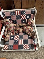 white wood patio chair with 2 teddy bears