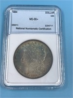 Morgan silver dollar 1884 MS66 + by NNC