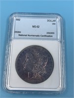 Morgan silver dollar 1892 MS62 with beautiful toni