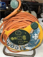 ORANGE EXTENSION CORD AND REEL