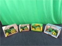 4 John Deere toy tractors