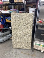 Slab of granite 51 in long 27 in wide very heavy