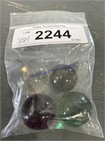 BAG OF 4 LARGER CLEAR MARBLES