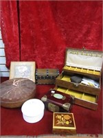 Jewelry boxes and sewing basket.
