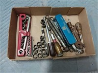 assortment of hand tools - wrenches, sockets,