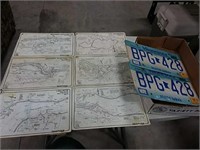 assortment of river maps and lic plates
