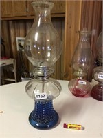 Clear glass kerosene lamp