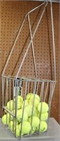 Misc Tennis Balls in Wire Basket