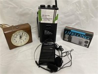 Lot of portable radios with an alarm clock