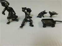Pewter Figurines 2.5" T, 1.5" W. Lady on chair,