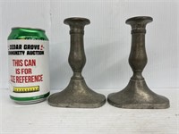 Two stieff pewter candlestick holders