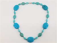 Turquoise necklace with different size beads and s