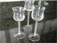 Three Twisted Colored Stem Candle Holders
