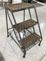 3-step ladder on casters