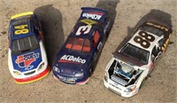 3 toy race cars