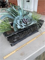 Outdoor planter box filled with artificial