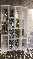 Nuts, bolts, washers in plano case