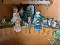 Bottom shelf ceramic figurines & light-up tree