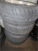 (4)205/50R15 tires on rims. 4 bolt pattern.
