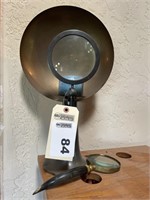 Candle lamp with magnifying glass