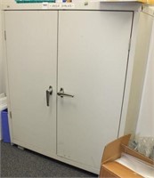 2 door utility cabinet & box of 3 mil poly bags