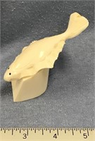 4" fossilized ivory carving of halibut on an ivory