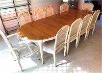 5ft-9ft expansion table w/ 10 chairs- good cond.
