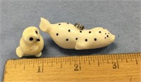 2 ivory carvings, one is 2" spotted seal with inse