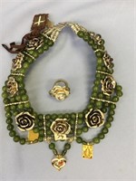 Jade necklace with silver-plated flowers set with