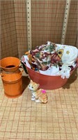 Towels bucket and tin and cat