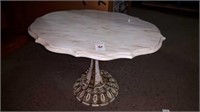 Marble table on metal base